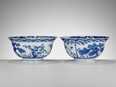 Lot 103 - AN ABSOLUTELY PERFECT PAIR OF BLUE AND WHITE ‘THREE FRIENDS OF WINTER’ KLAPMUTS BOWLS, KANGXI PERIOD