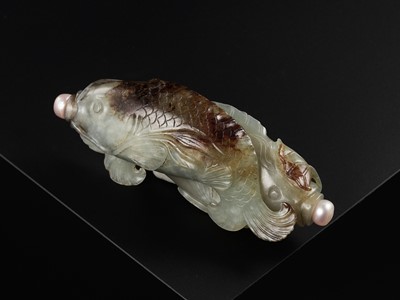 Lot 126 - A CELADON AND RUSSET JADE ‘DOUBLE FISH’ SNUFF BOTTLE, CHINA, 1680-1750