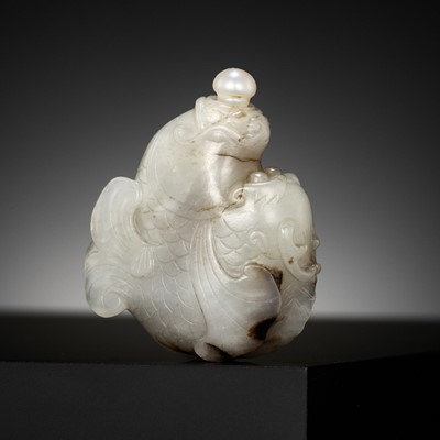 Lot 125 - A NEPHRITE JADE ‘DRAGON CARP’ SNUFF BOTTLE, ATTRIBUTED TO THE IMPERIAL PALACE WORKSHOPS