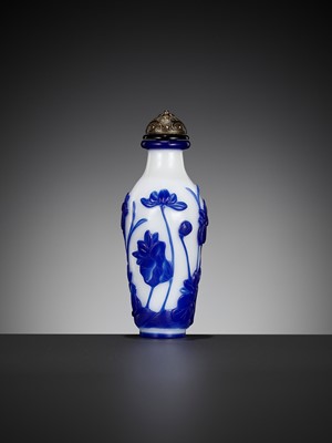 Lot 55 - A SAPPHIRE-BLUE GLASS OVERLAY ‘LOTUS POND’ SNUFF BOTTLE, ATTRIBUTED TO THE IMPERIAL GLASSWORKS, BEIJING, 1750-1790