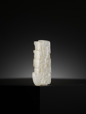 AN ARCHAISTIC WHITE JADE AXE-SHAPED ‘CHILONG’ PENDANT, 18TH-19TH CENTURY