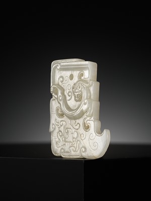 AN ARCHAISTIC WHITE JADE AXE-SHAPED ‘CHILONG’ PENDANT, 18TH-19TH CENTURY