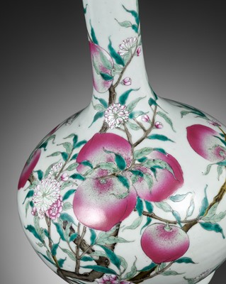 Lot 253 - A FAMILLE ROSE ‘NINE PEACHES’ BOTTLE VASE, QING DYNASTY