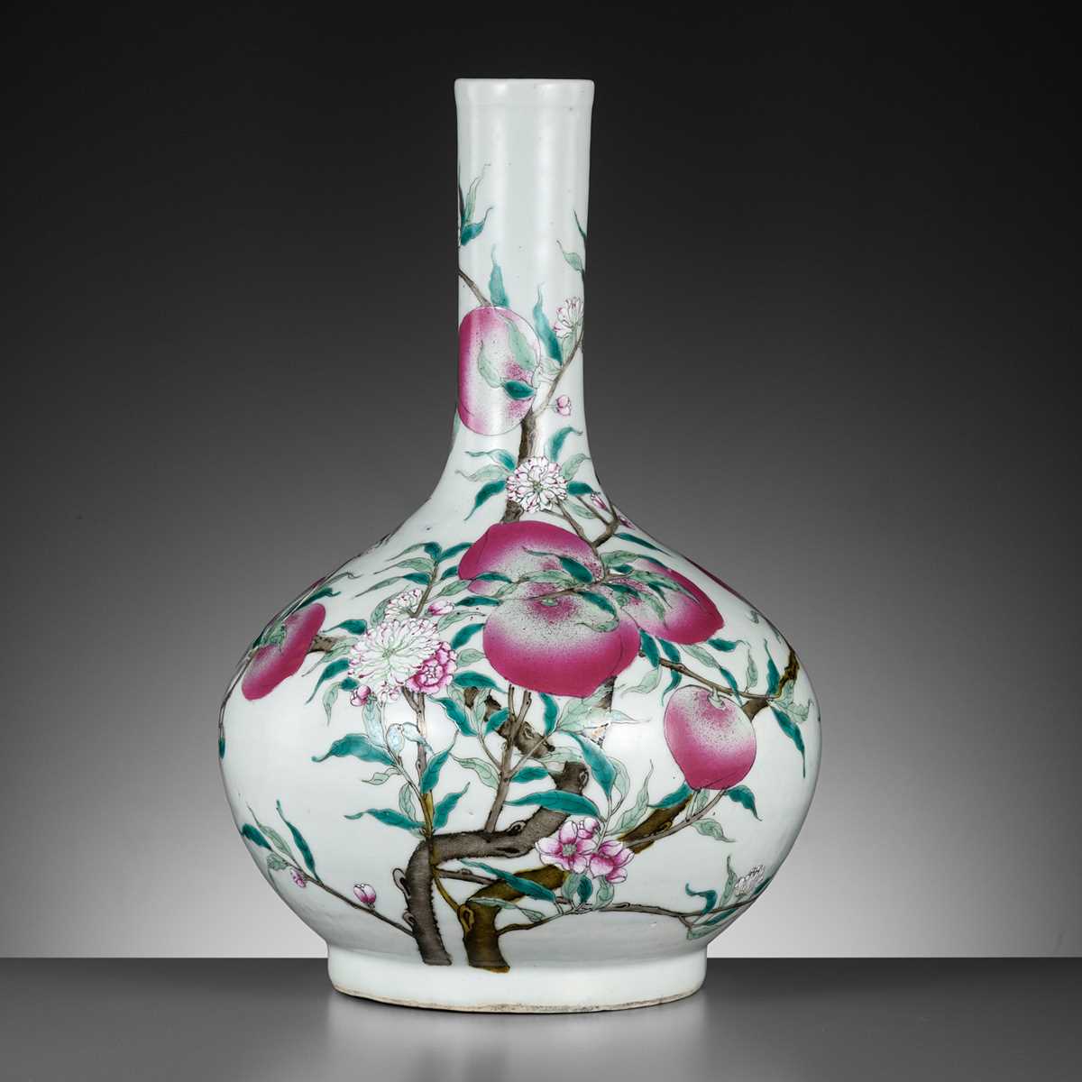 Lot 253 - A FAMILLE ROSE ‘NINE PEACHES’ BOTTLE VASE, QING DYNASTY