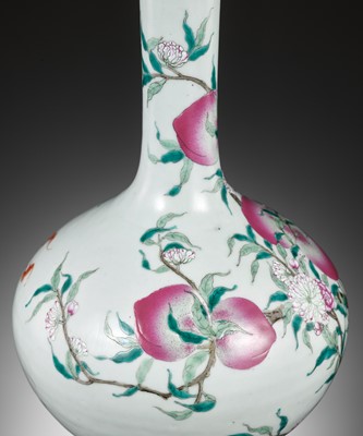 Lot 253 - A FAMILLE ROSE ‘NINE PEACHES’ BOTTLE VASE, QING DYNASTY