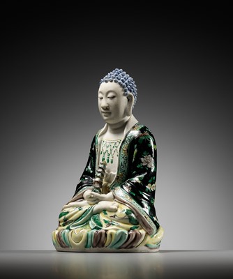 Lot 530 - A FAMILLE VERTE BISCUIT FIGURE OF BUDDHA, QING DYNASTY
