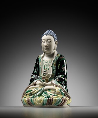 Lot 530 - A FAMILLE VERTE BISCUIT FIGURE OF BUDDHA, QING DYNASTY