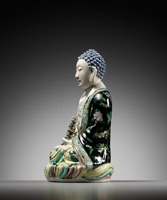Lot 530 - A FAMILLE VERTE BISCUIT FIGURE OF BUDDHA, QING DYNASTY