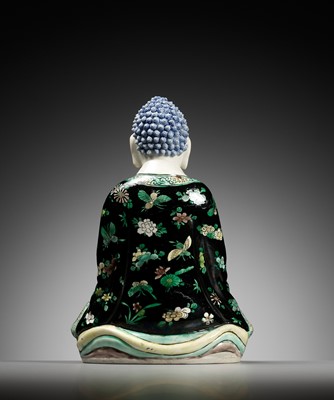 Lot 530 - A FAMILLE VERTE BISCUIT FIGURE OF BUDDHA, QING DYNASTY