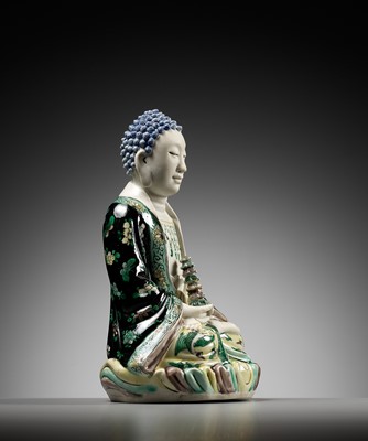 Lot 530 - A FAMILLE VERTE BISCUIT FIGURE OF BUDDHA, QING DYNASTY