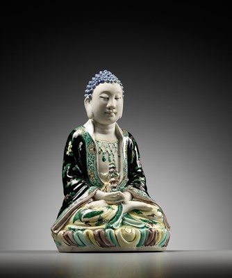 Lot 530 - A FAMILLE VERTE BISCUIT FIGURE OF BUDDHA, QING DYNASTY