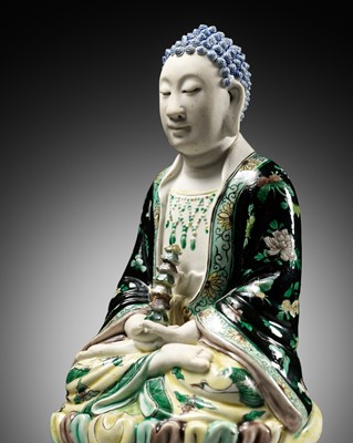 Lot 530 - A FAMILLE VERTE BISCUIT FIGURE OF BUDDHA, QING DYNASTY