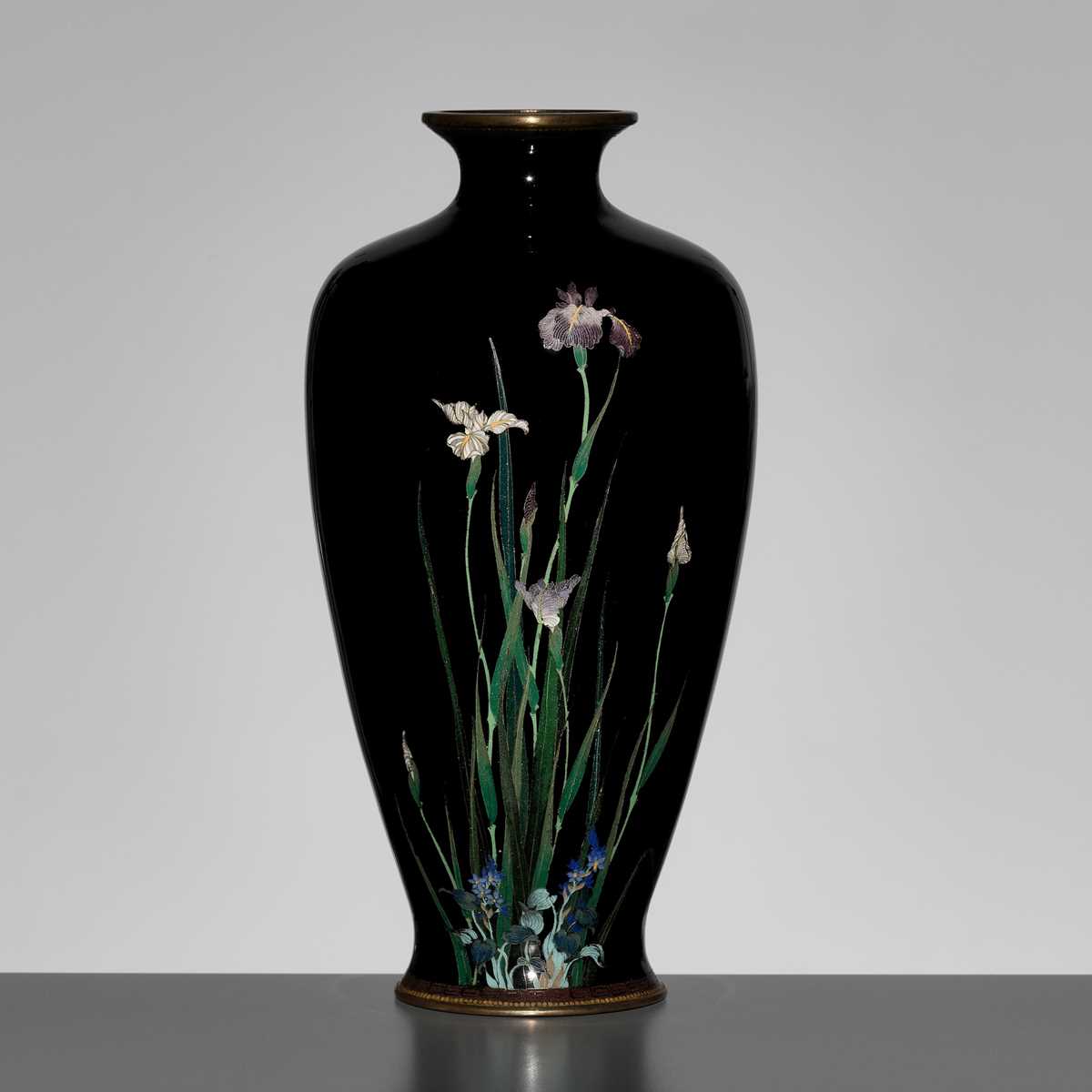 Lot 124 - A MIDNIGHT-BLUE-GROUND CLOISONNÉ ENAMEL VASE WITH SHOBU (IRIS) AND KIKYO (CHINESE BELLFLOWER)