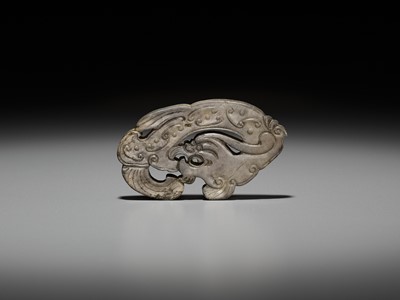 Lot 1053 - A GRAY JADE ‘DRAGON’ PENDANT, LATE MING TO EARLY QING DYNASTY