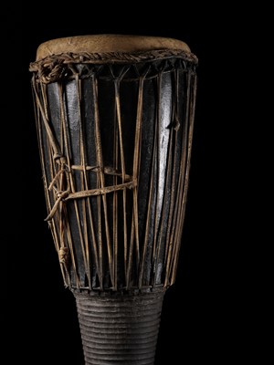Lot 398 - A TALL BURMESE LACQUERED WOOD DRUM, 19TH CENTURY