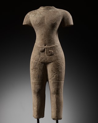 Lot 270 - A SANDSTONE TORSO OF A MALE DEITY, ANGKOR PERIOD, BAPHUON STYLE