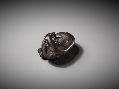 Lot 111 - A BRONZE ‘BUDDHIST LION’ SCROLL WEIGHT, LATE MING DYNASTY