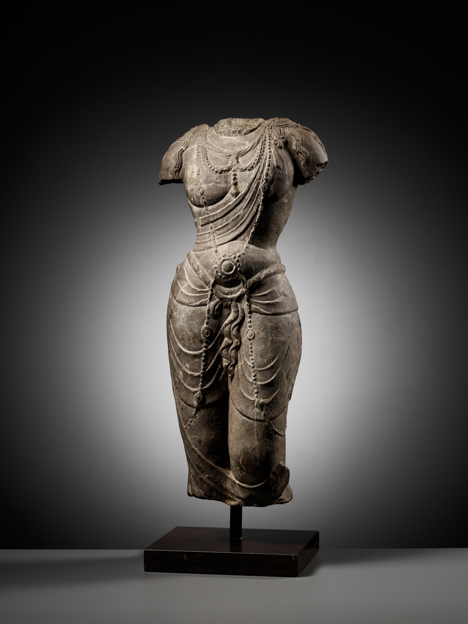 Lot 171 - A LIMESTONE TORSO OF A BODHISATTVA, TANG