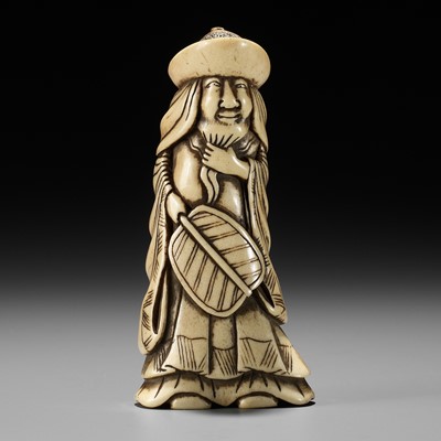 Lot 284 - AN ANTLER NETSUKE OF A DUTCHMAN