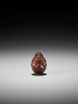 Lot 376 - A KURUMI (WALNUT) NETSUKE OF A ROLY POLY DARUMA