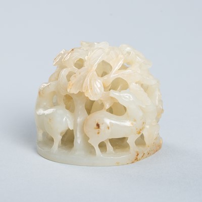 Lot 881 - AN OPENWORK JADE HAT FINIAL WITH DEER, QING DYNASTY
