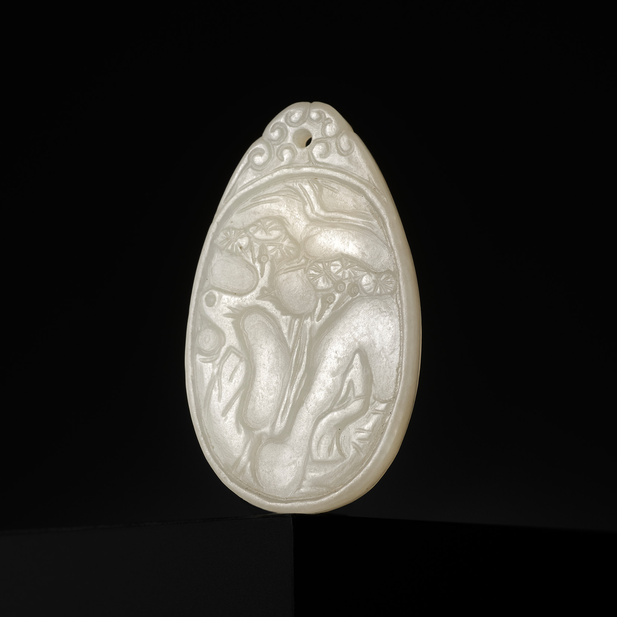 Lot 1753 - A WHITE JADE MINIATURE PENDANT, SIGNED