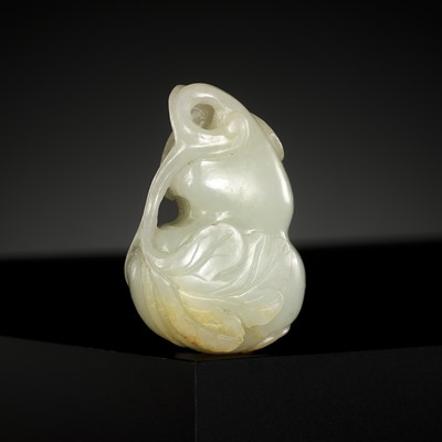 Lot 446 - A PALE CELADON JADE ‘DOUBLE GOURD’ PENDANT, QING DYNASTY