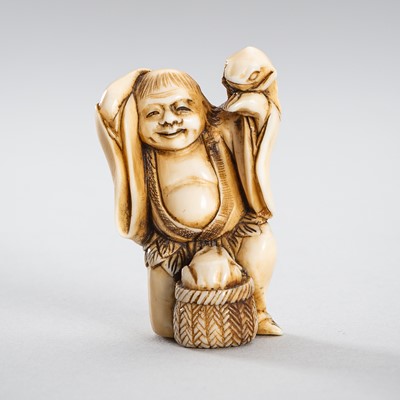 Lot 1551 - A SMALL IVORY NETSUKE OF GAMA SENNIN WITH HIS TOAD