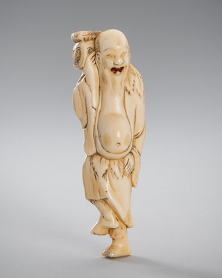 Lot 329 - A FINE IVORY NETSUKE OF A SENNIN