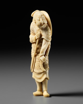 AN IVORY NETSUKE OF A LAUGHING TARTAR ARCHER