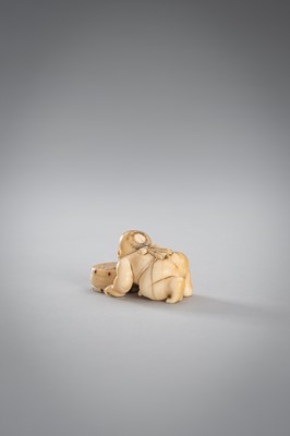 Lot 342 - A SMALL IVORY NETSUKE OF A BOY WITH A DRUM