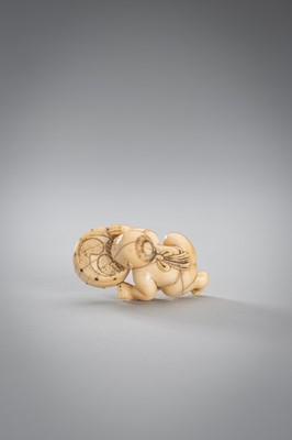 Lot 342 - A SMALL IVORY NETSUKE OF A BOY WITH A DRUM