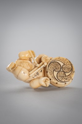 Lot 342 - A SMALL IVORY NETSUKE OF A BOY WITH A DRUM