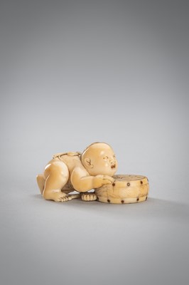Lot 342 - A SMALL IVORY NETSUKE OF A BOY WITH A DRUM