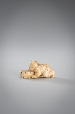 Lot 342 - A SMALL IVORY NETSUKE OF A BOY WITH A DRUM