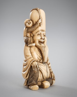 Lot 1511 - KOZAN: AN AMUSING IVORY NETSUKE OF FUKUROKUJU AND KARAKO