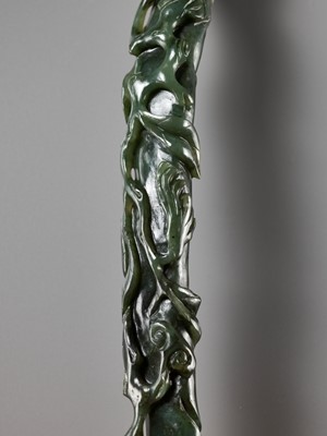 Lot 41 - A SPINACH-GREEN JADE ‘LINGZHI AND FINGER CITRON’ RUYI SCEPTER, CHINA, 18TH CENTURY