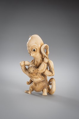 Lot 313 - A FINE IVORY OKIMONO OF A MAN FIGHTING AN OCTOPUS
