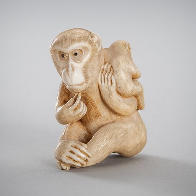 Lot 1538 - TOMOKAZU: AN IVORY NETSUKE OF TWO MONKEYS