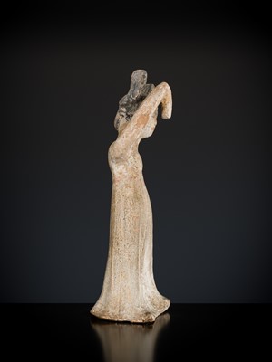 Lot 434 - A PAINTED POTTERY FIGURE OF A DANCING LADY, TANG DYNASTY