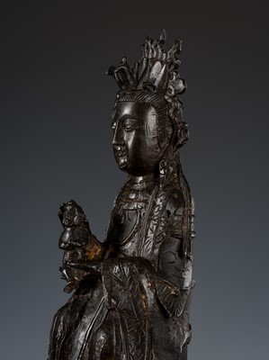 Lot 328 - A BRONZE FIGURE OF SONGZI GUANYIN AND CHILD, MING DYNASTY