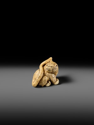 Lot 151 - A POWERFUL OSAKA SCHOOL IVORY NETSUKE OF A CROUCHING TIGER