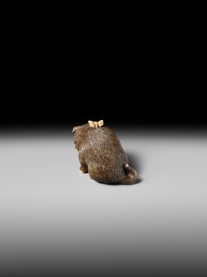 Lot 154 - RAKU: A SUPERB OSAKA SCHOOL IVORY NETSUKE OF A PUPPY AND BUTTERFLY