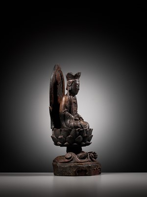 Lot 74 - A LACQUERED WOOD FIGURE OF GUANYIN, MING DYNASTY