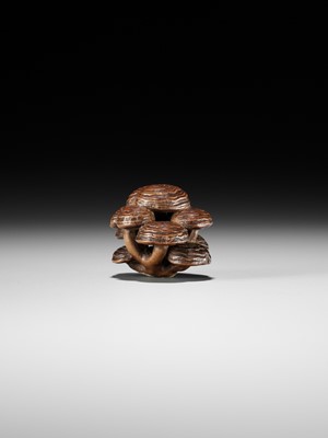 Lot 317 - A WOOD NETSUKE OF REISHI FUNGI