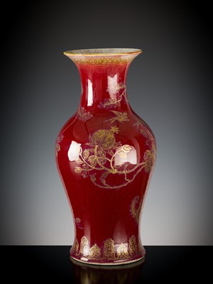 Lot 277 - A RED-GLAZED AND GILT DECORATED ‘BIRDS WORSHIPPING THE PHOENIX’ VASE, LATE QING DYNASTY