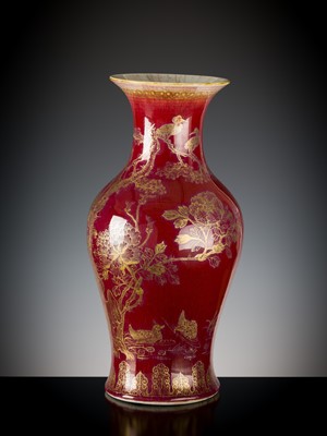 Lot 277 - A RED-GLAZED AND GILT DECORATED ‘BIRDS WORSHIPPING THE PHOENIX’ VASE, LATE QING DYNASTY