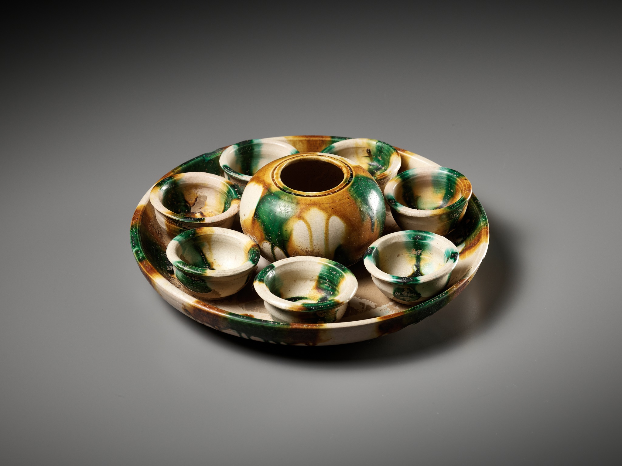 Lot 151 - A SANCAI-GLAZED POTTERY TEA SET, TANG