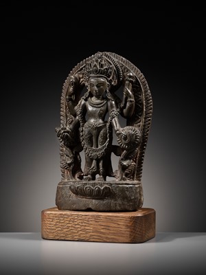 Lot 183 - A LIMESTONE STELE OF VISHNU, LATE MALLA, THREE KINGDOMS PERIOD