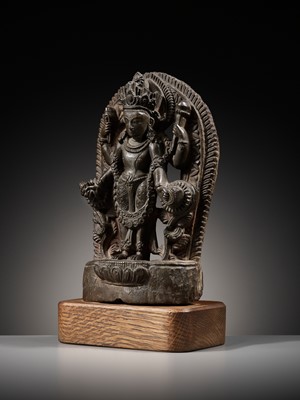 Lot 183 - A LIMESTONE STELE OF VISHNU, LATE MALLA, THREE KINGDOMS PERIOD